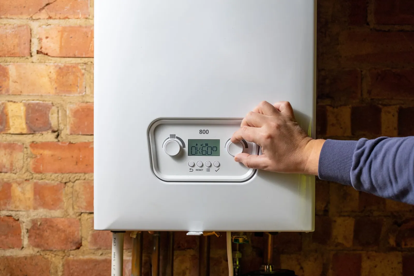 Wall-mounted boiler in a UK home