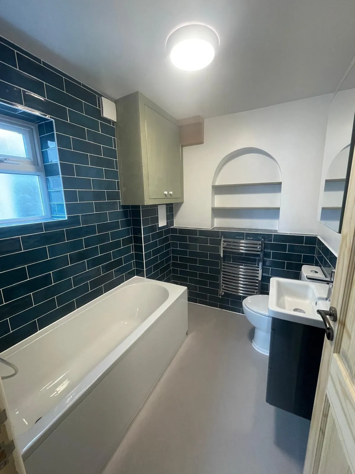 Commercial bathroom egham after teal tiles by Trade Square
