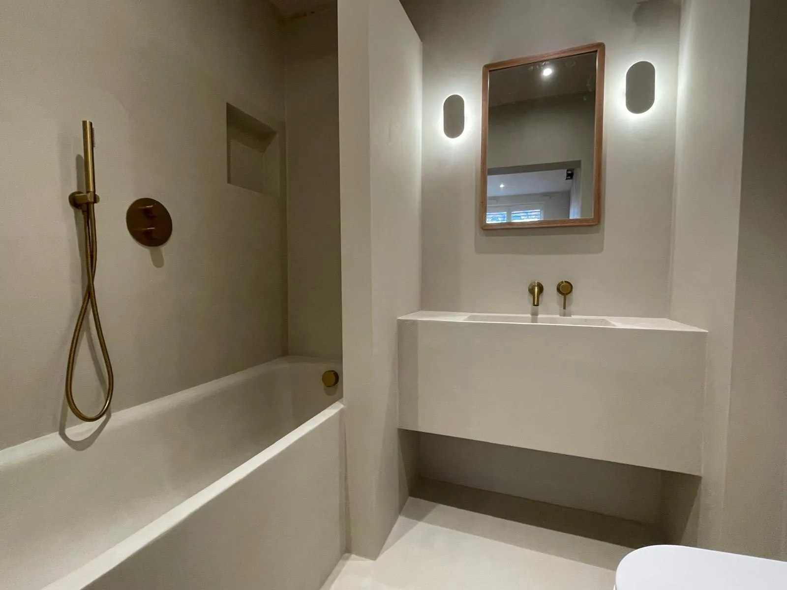 Brass bathroom taps and fixtures fitted in Egham