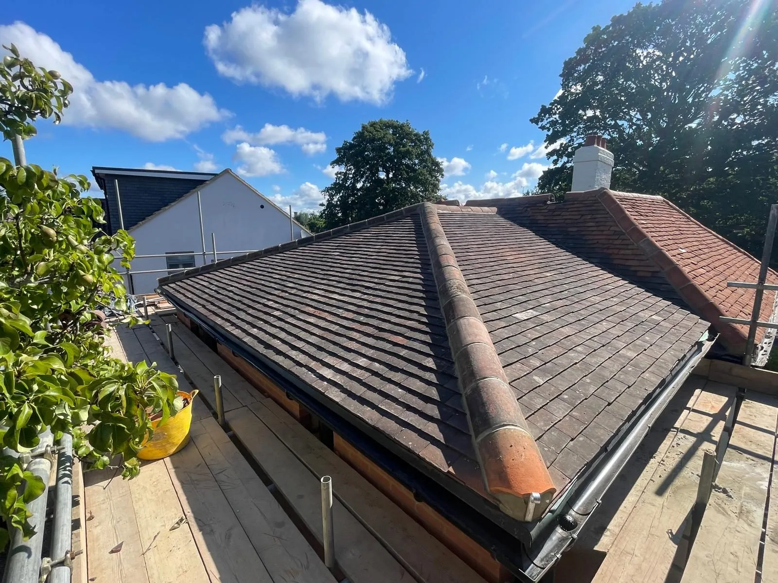 House extension windsor clay tile roof by Trade Square